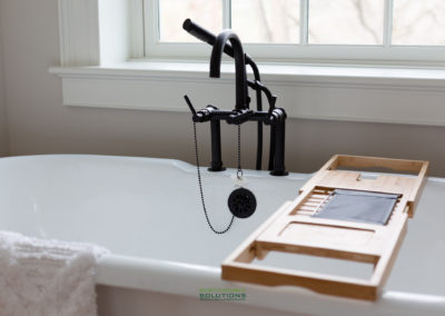 Detailed shot of claw foot tub faucet