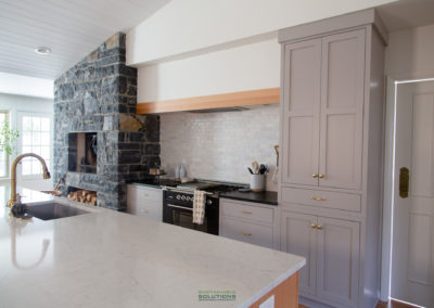 Kitchen with Custom Cabinetry and Bluestone Fireplace