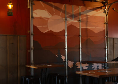The custom painting by local artist Melissa Huryk on the garage door at Pale Fire Brewing Co in Basye, VA.